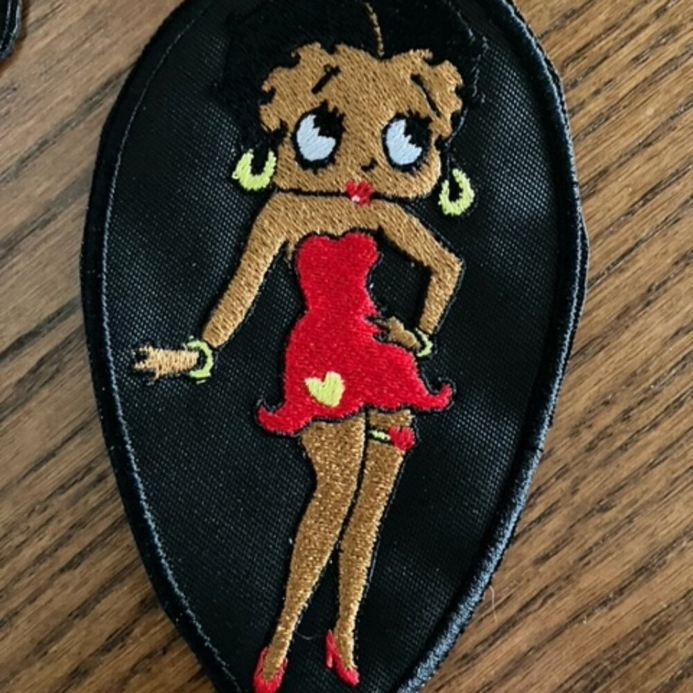 Black Betty Boop embroidered patch donning her usual skimpy red dress red shoes